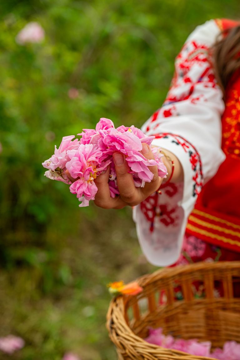 A hand with rose blossoms
