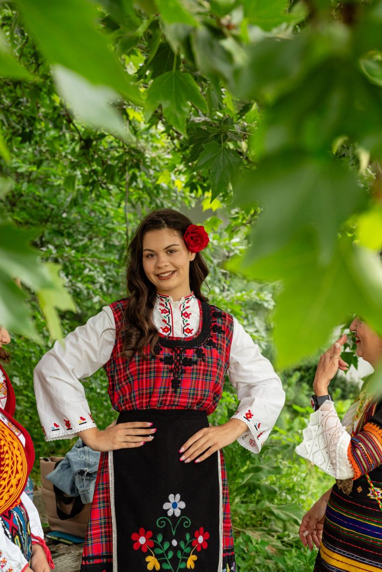 Young lady with traditional costume at Rose festival Bulgaria