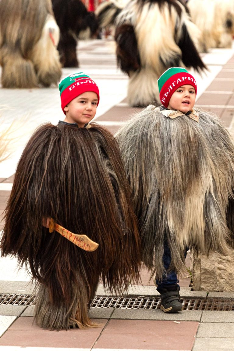 Children dressed as kukeri taking part in a winter folklore festival in Bulgaria